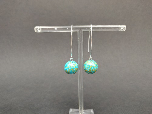 Boucle d’oreille en argent, turquoise, or